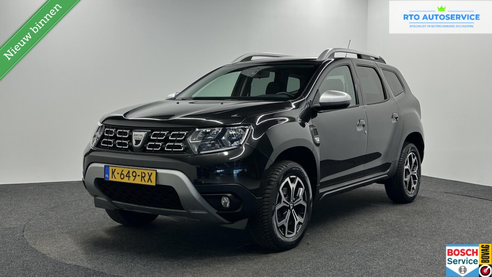 Dacia Duster - 1.0 TCe Bi-Fuel Prestige CAMERA LEER NAVI CARPLAY LM. - AutoWereld.nl