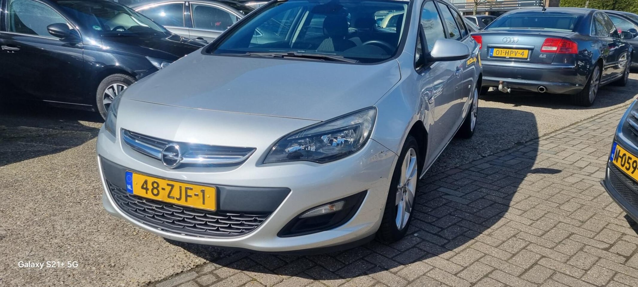 Opel Astra Sports Tourer - 1.4 Cosmo - AutoWereld.nl