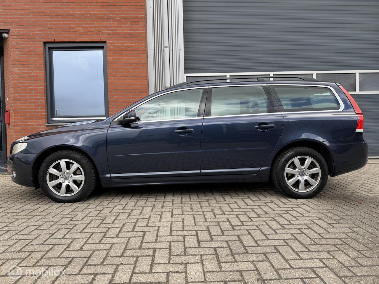 Volvo V70 - 2.0 T5 245pk Geartronic 8-traps Nordic+ - leder - AutoWereld.nl