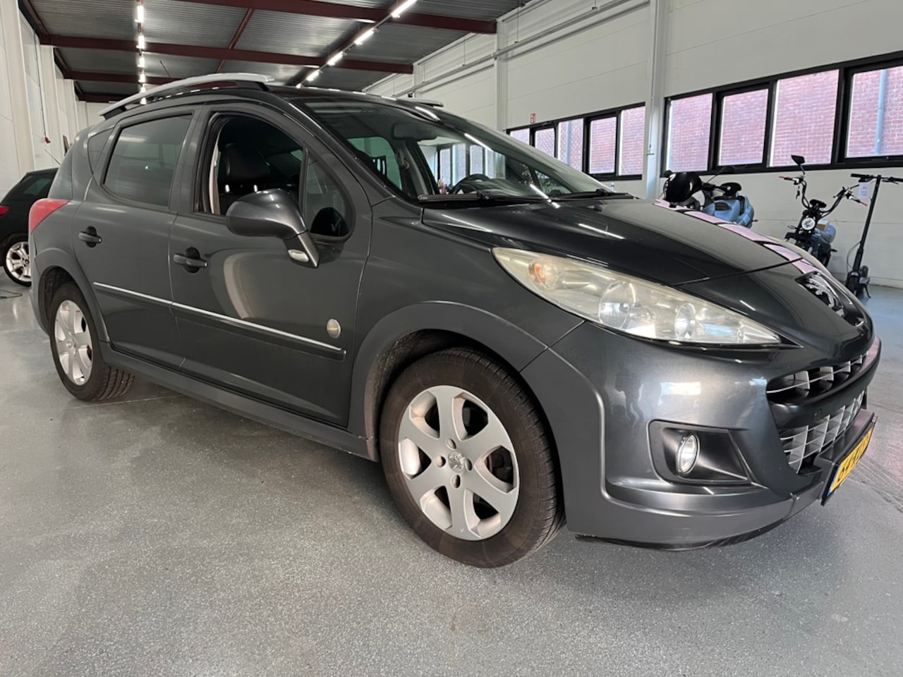 Peugeot 207 SW Outdoor - 1.6 VTi Panaromadak - AutoWereld.nl