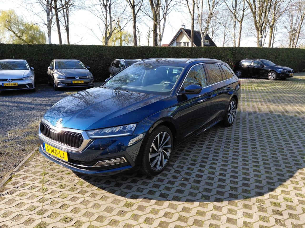 Skoda Octavia Combi - 1.0 TSI Business Edition Plus 18 inch, navi, electrische klep - AutoWereld.nl