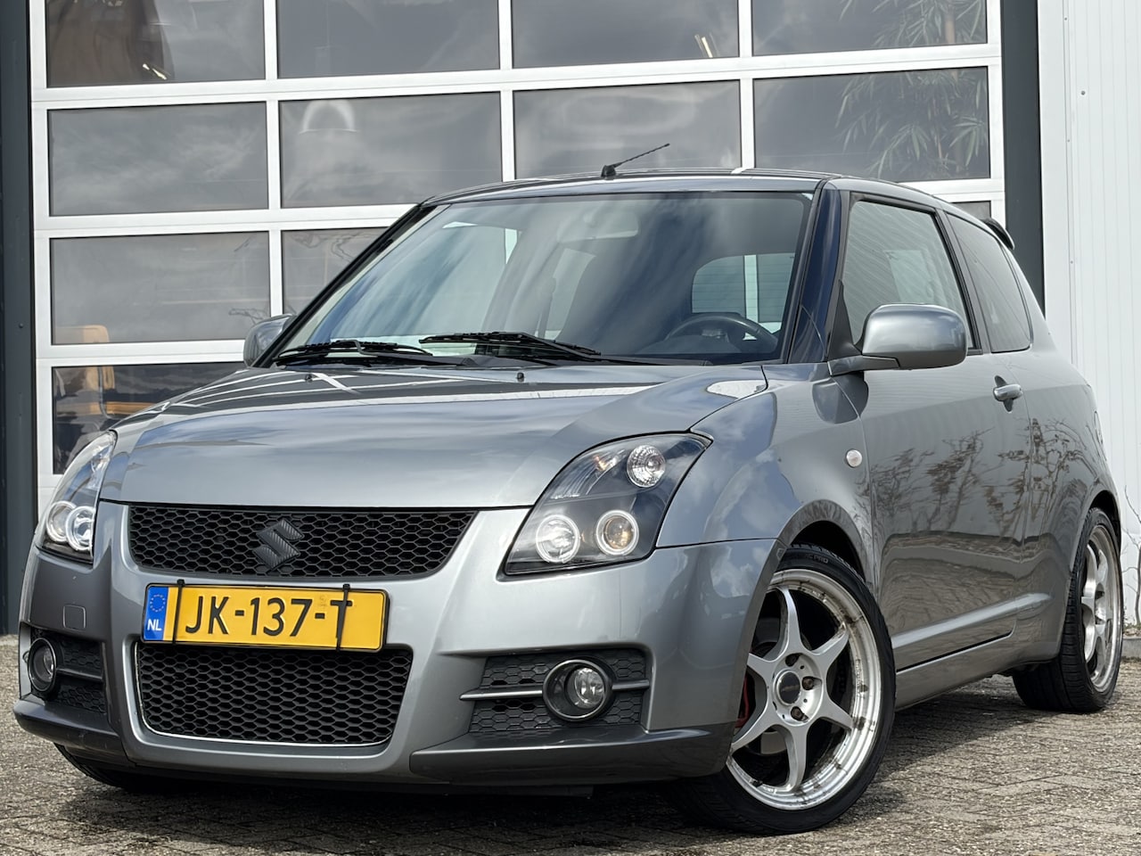 Suzuki Swift - 1.6 Sport 126pk | Airco (automatisch) | Bluetooth | Elektrische ramen voor | Lichtmetalen - AutoWereld.nl
