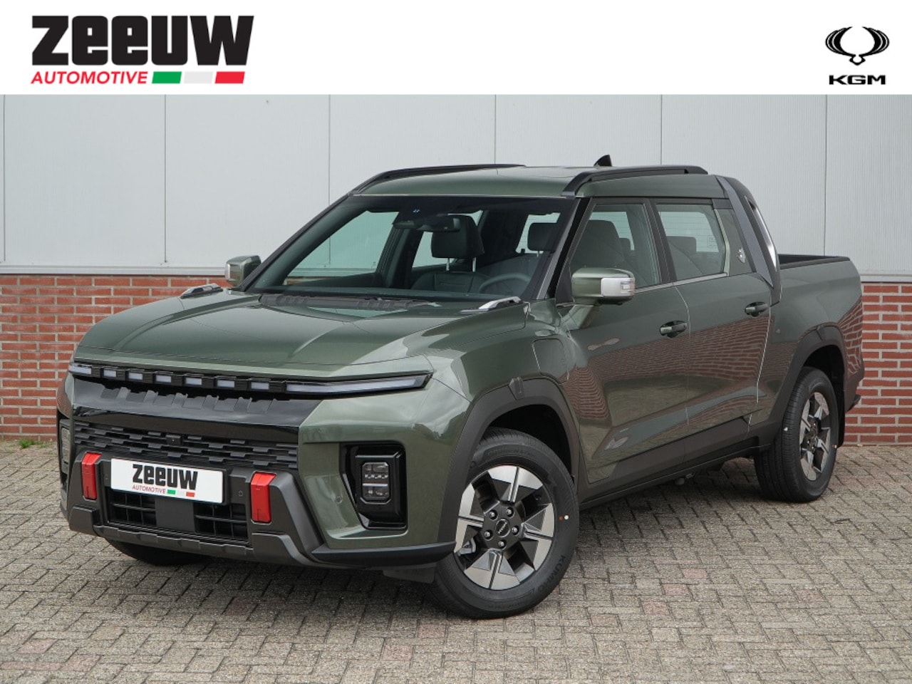 KGM Musso EV - 80,6 kWh Titanium Amazonia Green direct leverbaar - AutoWereld.nl