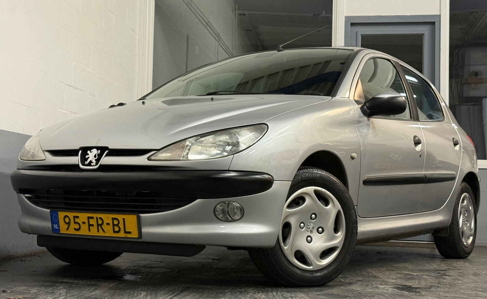 Peugeot 206 - 1.4 Gentry|NAP|NweAPK|Airco|Glazendak|5Deurs| - AutoWereld.nl