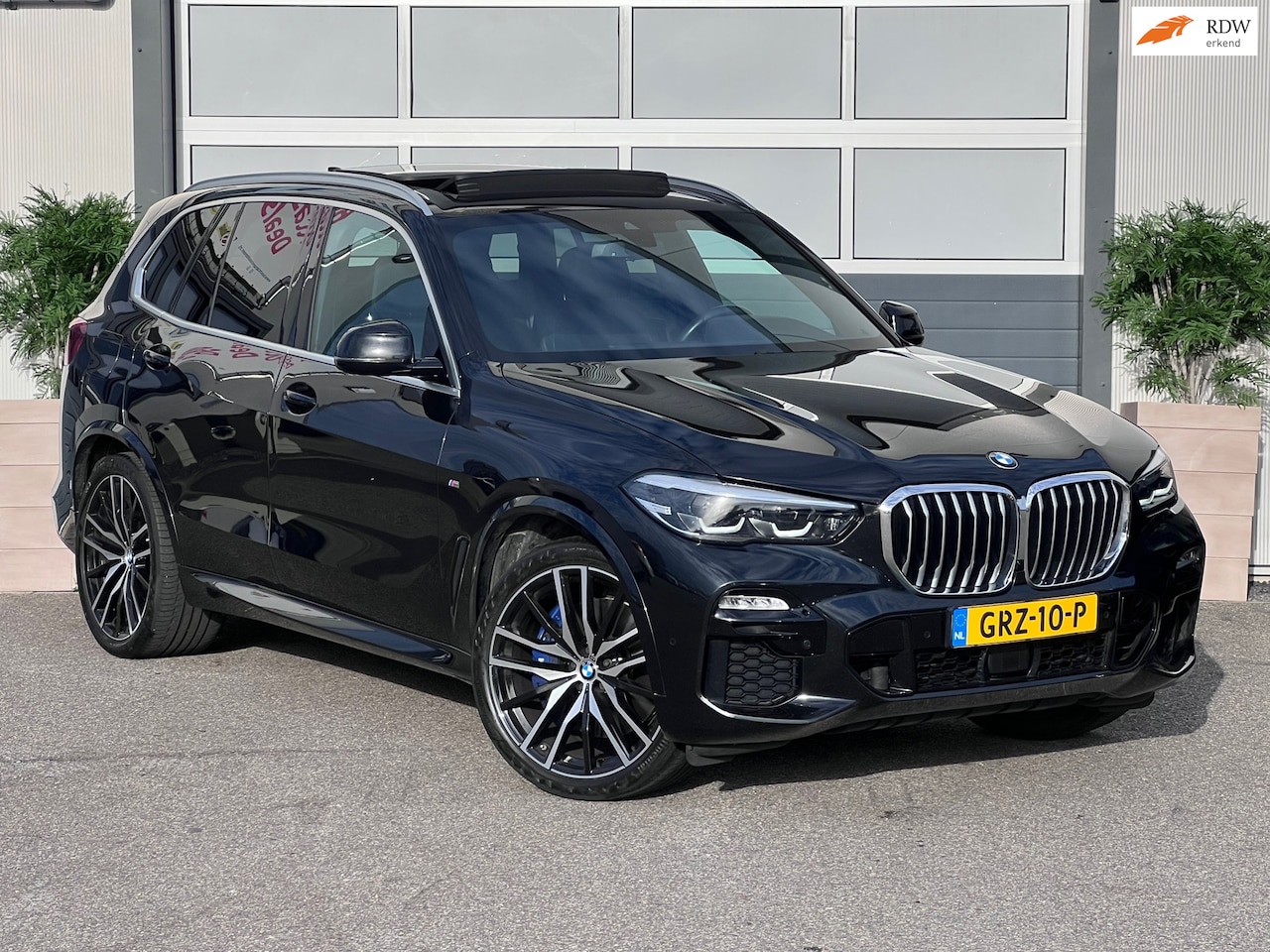 BMW X5 - XDrive40i Premium Selection High Executive M SPORT| DEALER GARANTIE|LUCHTVERING|PANO| - AutoWereld.nl
