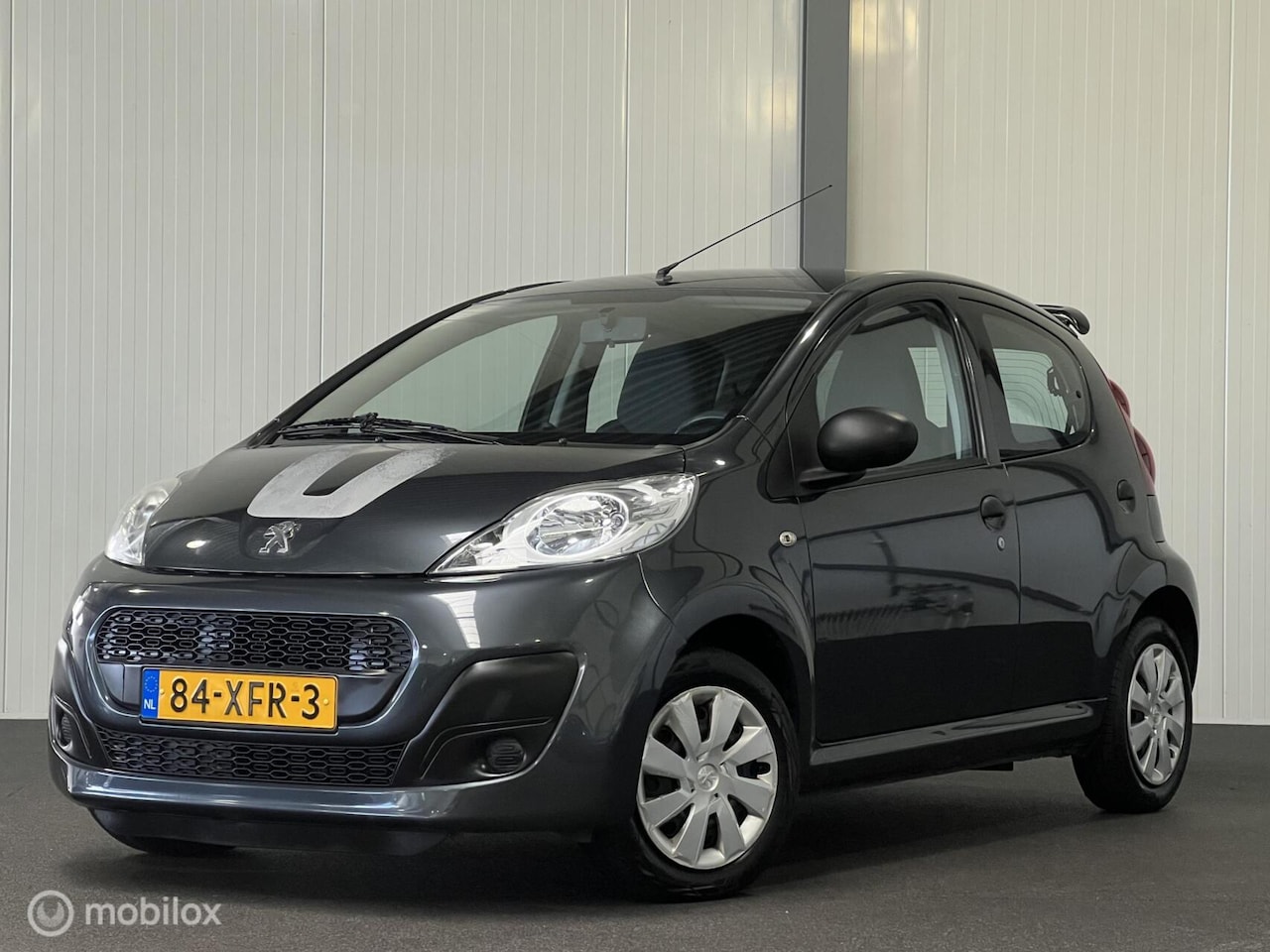 Peugeot 107 - 1.0 Access Accent 5-drs [ NAP airco spoiler ] - AutoWereld.nl