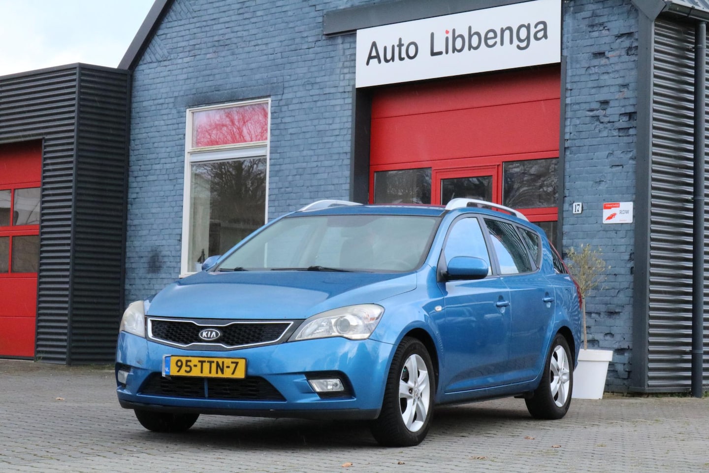 Kia Cee'd Sporty Wagon - 1.4 CVVT Navigator Plus Pack 1.4 CVVT Navigator Plus Pack - AutoWereld.nl