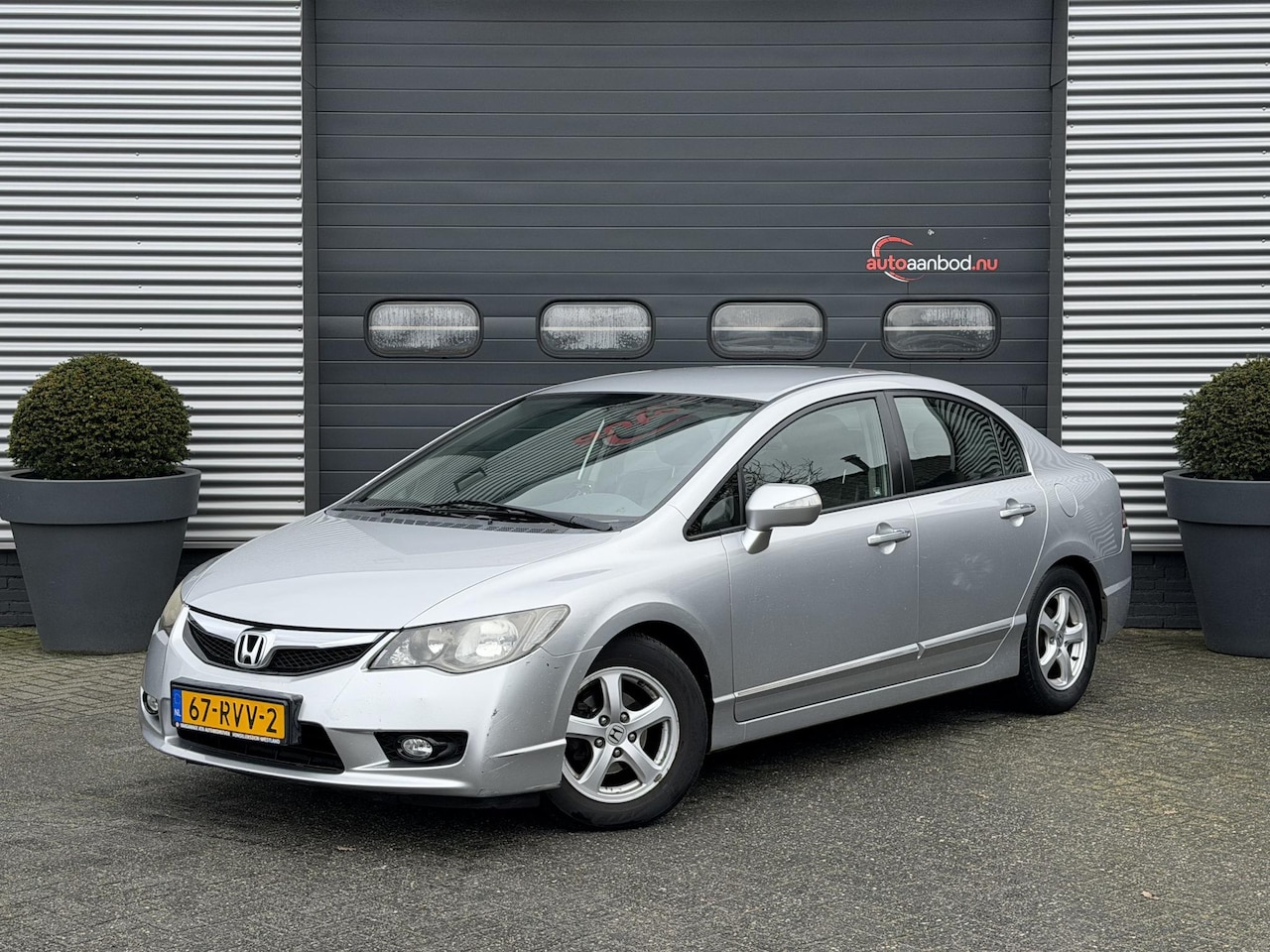 Honda Civic - 1.3 Hybrid Comfort | Navigatie | Lederen Bekleding | Stoelverwarming | Lichtmetalen Velgen - AutoWereld.nl