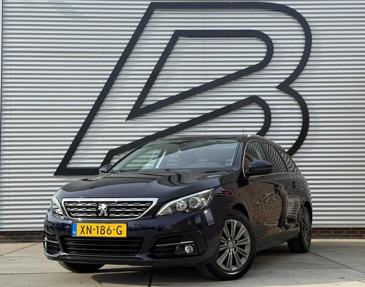 Peugeot 308 SW - 1.2 PureTech Allure 2e Eigenaar|Navi|Clima|Pano|cruise|Carplay|PDC V+A|N.A.P|APK tot 02-20 - AutoWereld.nl