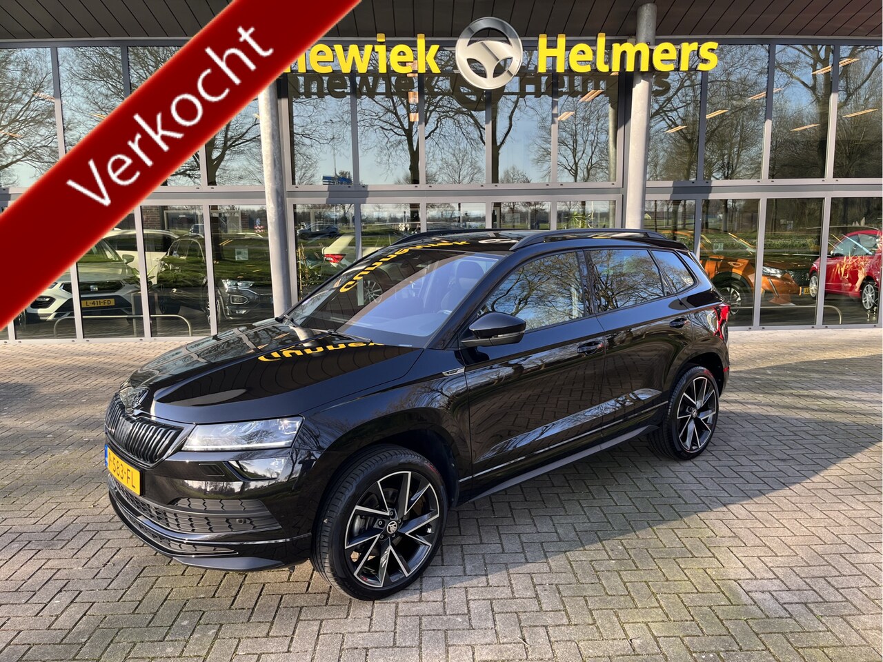Skoda Karoq - 1.5 TSI ACT Sportline Business | AUTOMAAT | CAMERA | CARPLAY | NAVI | PDC V&A | STUUR/STOE - AutoWereld.nl