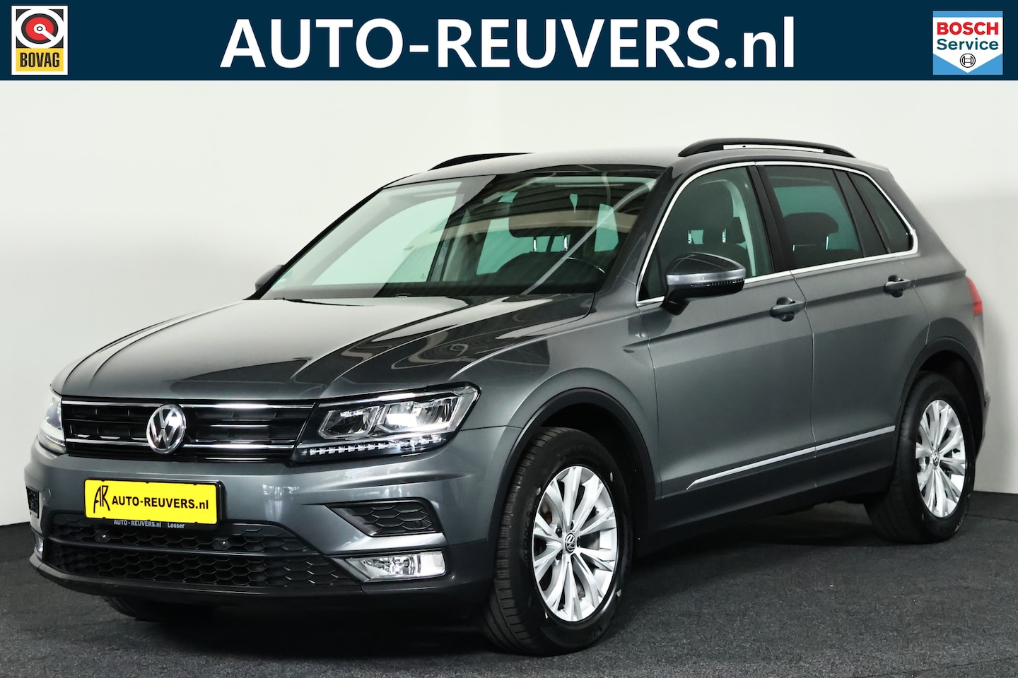 Volkswagen Tiguan - 1.4 TSI ACT Comfortline / DSG / Navi / LED / Trekhaak - AutoWereld.nl