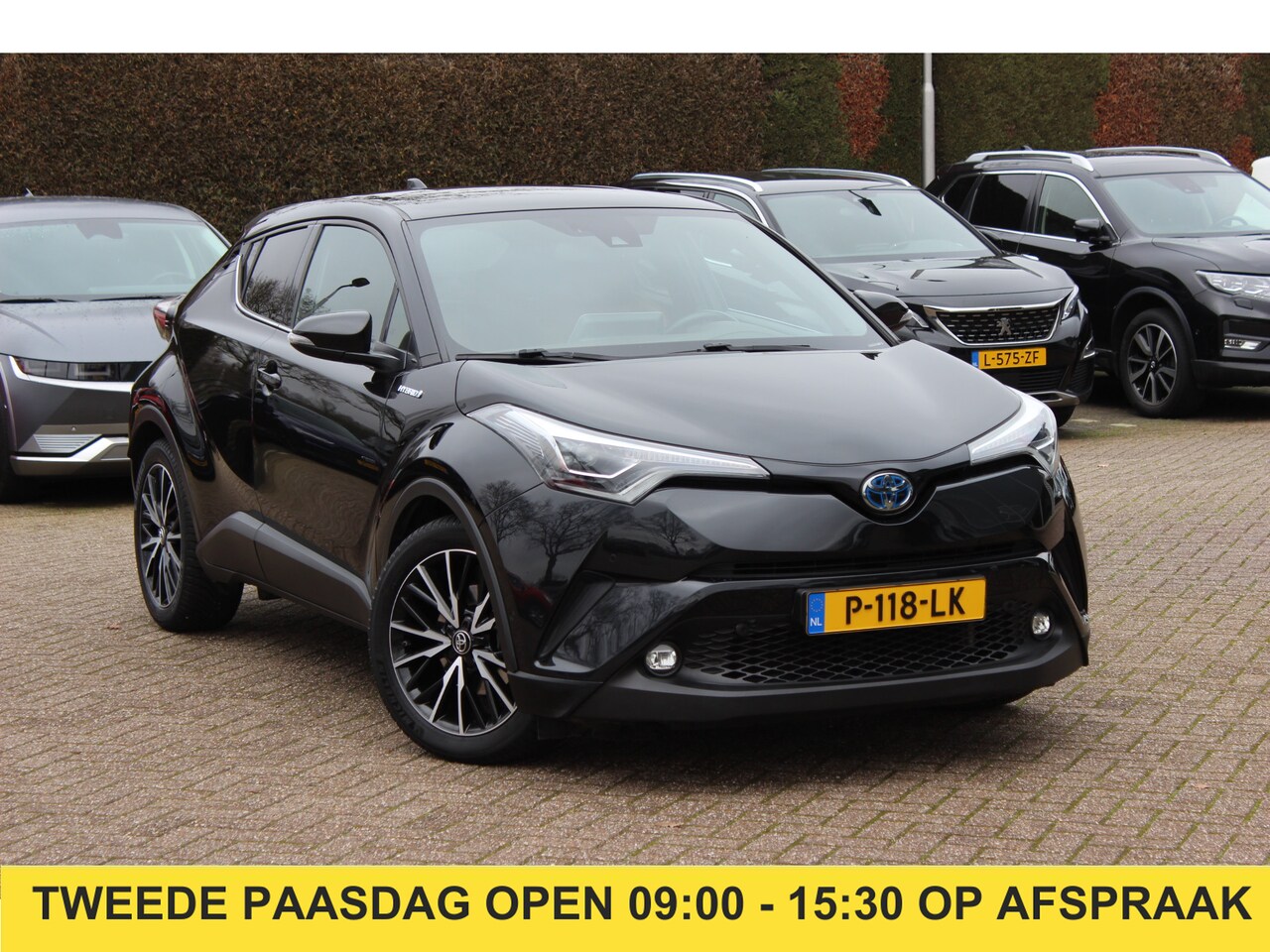 Toyota C-HR - 1.8 Hybrid Executive / Trekhaak / Bruin leder / Camera / 18 inch / Led Koplampen / Stoelve - AutoWereld.nl