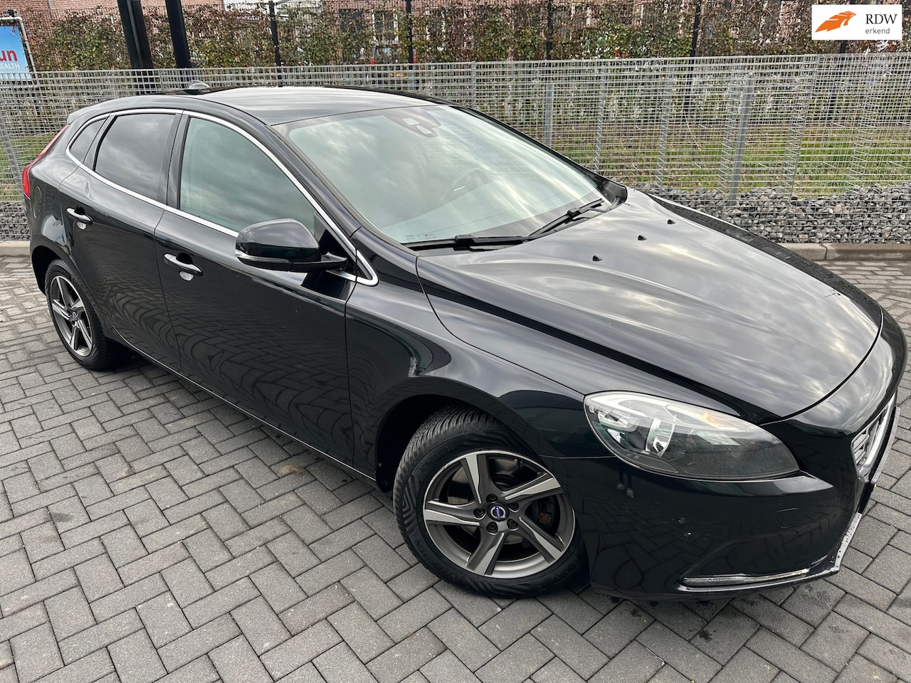Volvo V40 - 2.0 D4 R-Design Business / Navi / PDC / Clima / Cruise - AutoWereld.nl