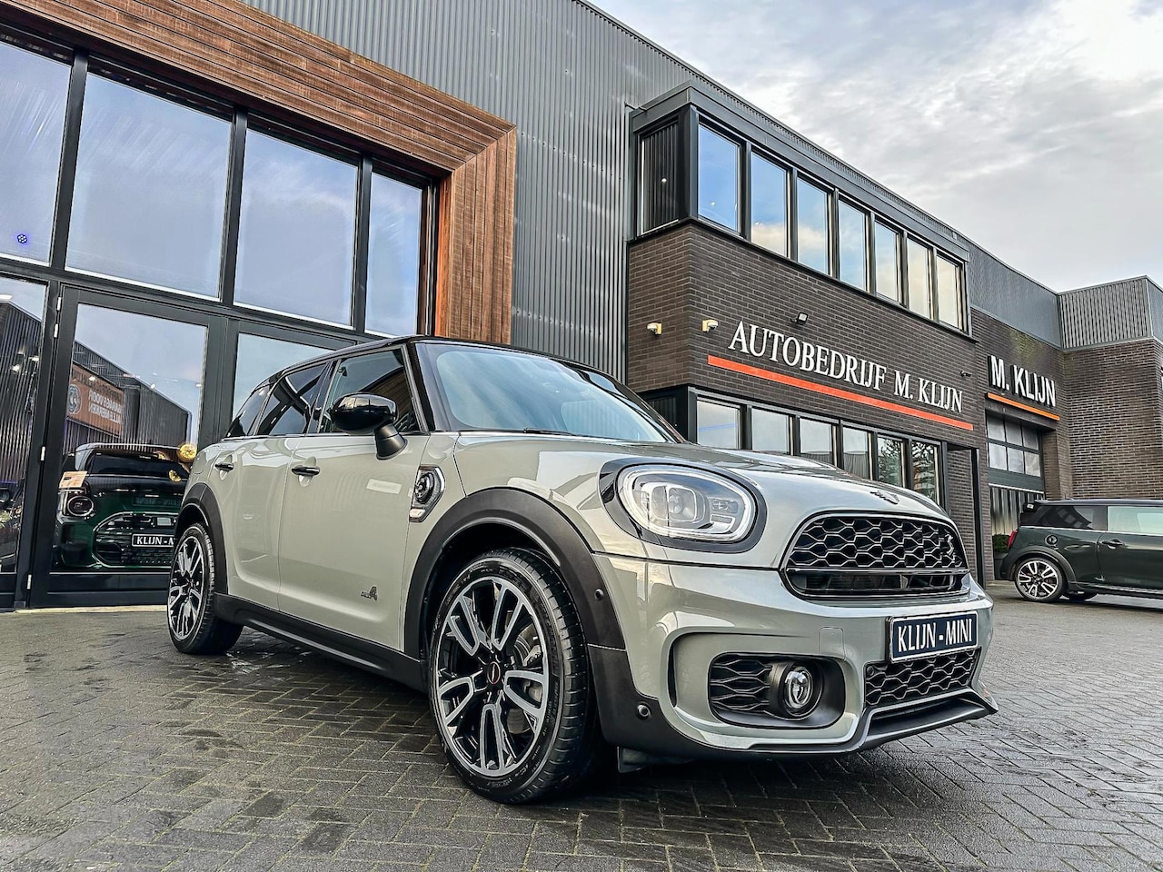 MINI Countryman - Mini 2.0 Cooper S E ALL4 John Cooper Works 220pk/Nardo/Lounge leer/Camera/19" Jcw/Vol - AutoWereld.nl