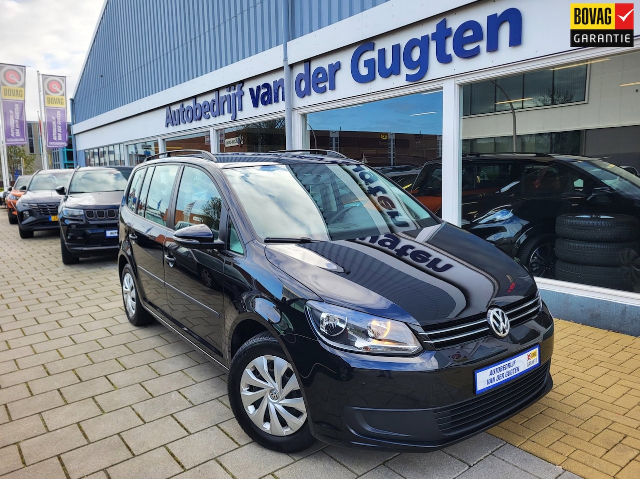 Volkswagen Touran - 1.2 TSI Trendline BlueMotion / Cruise Control / Parksensoren achter / - AutoWereld.nl