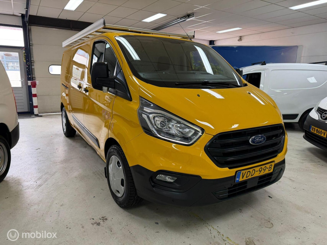 Ford Transit Custom - 270 2.0 TDCI L2H1 Airco cruise - AutoWereld.nl