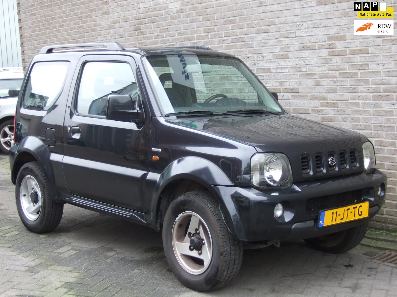 Suzuki Jimny - 1.3 Special - 4WD - Airco - Trekhaak - - AutoWereld.nl