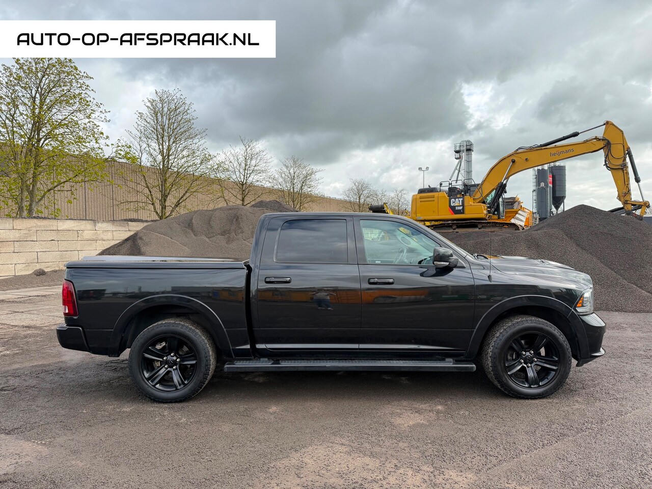 Dodge Ram 1500 - 5.7 V8 Quad Cab 6'4 Pano Leer BTW LPG-G3 - AutoWereld.nl