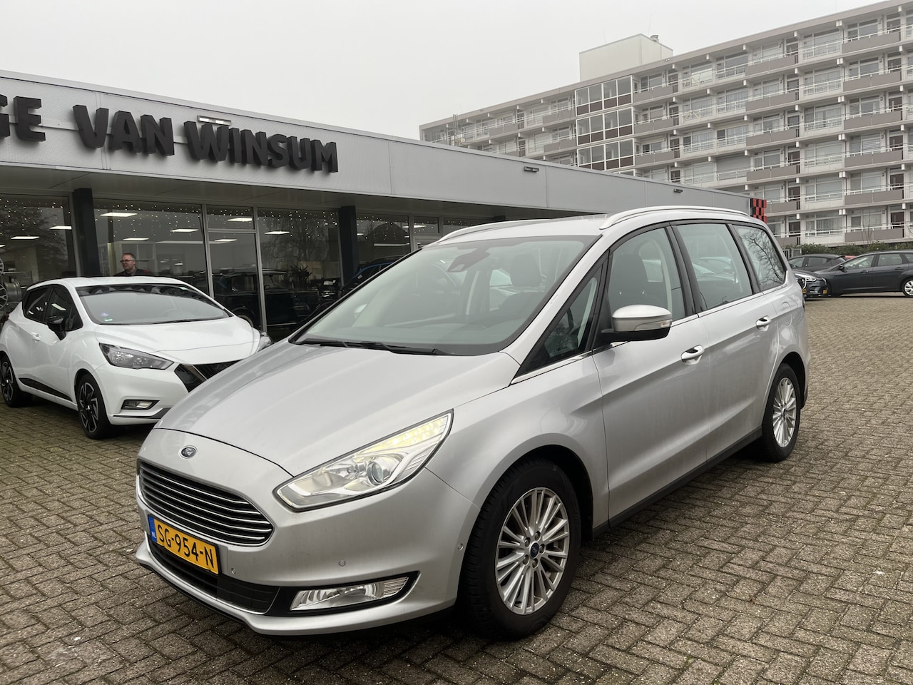 Ford Galaxy - 1.5 Titanium 7Pers Pdc Navi Cruise Lmv Stoelverw. NED auto Nap rapport Laatste foto! - AutoWereld.nl