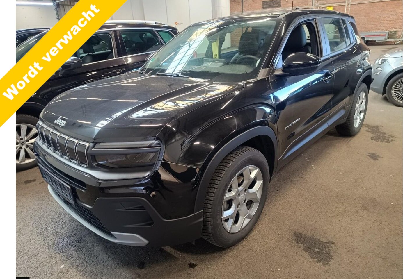 Jeep Avenger - 1.2 e-Hybrid Altitude Stoel en stuurverwarming/Electr achterklep. - AutoWereld.nl