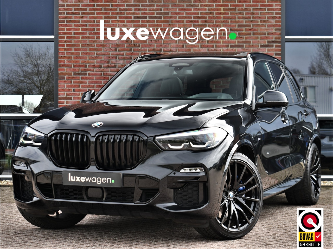 BMW X5 - xDrive40d M-Sport 7pers Pano Luchtv ACC Trekh H/K HUD 22inch 4WS Comf-seat - AutoWereld.nl