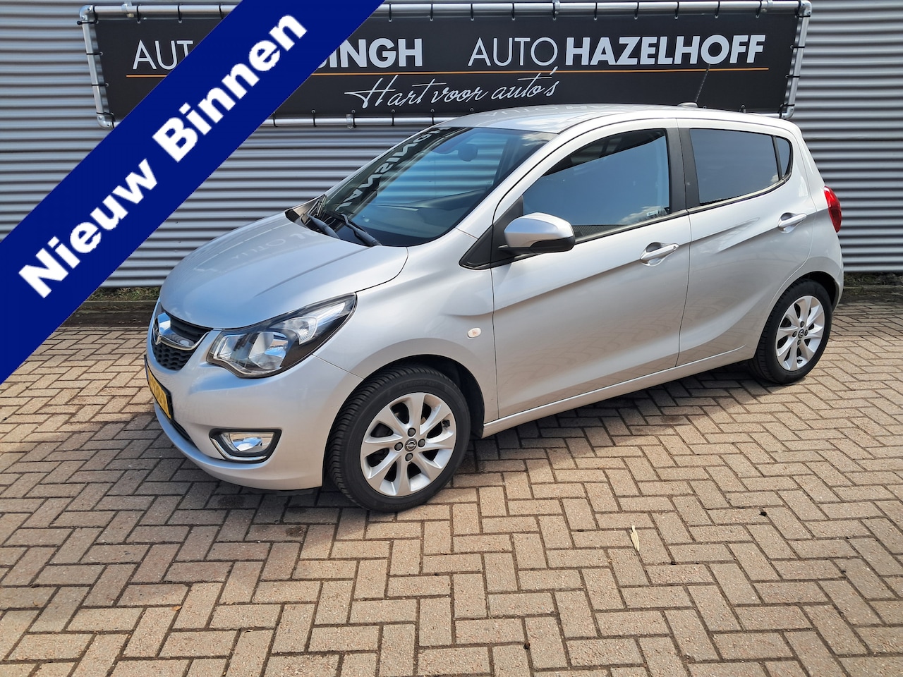 Opel Karl - 1.0 ecoFLEX Innovation met 33.747 km!! | Clima | Cruise control | Lederen bekleding | LM V - AutoWereld.nl