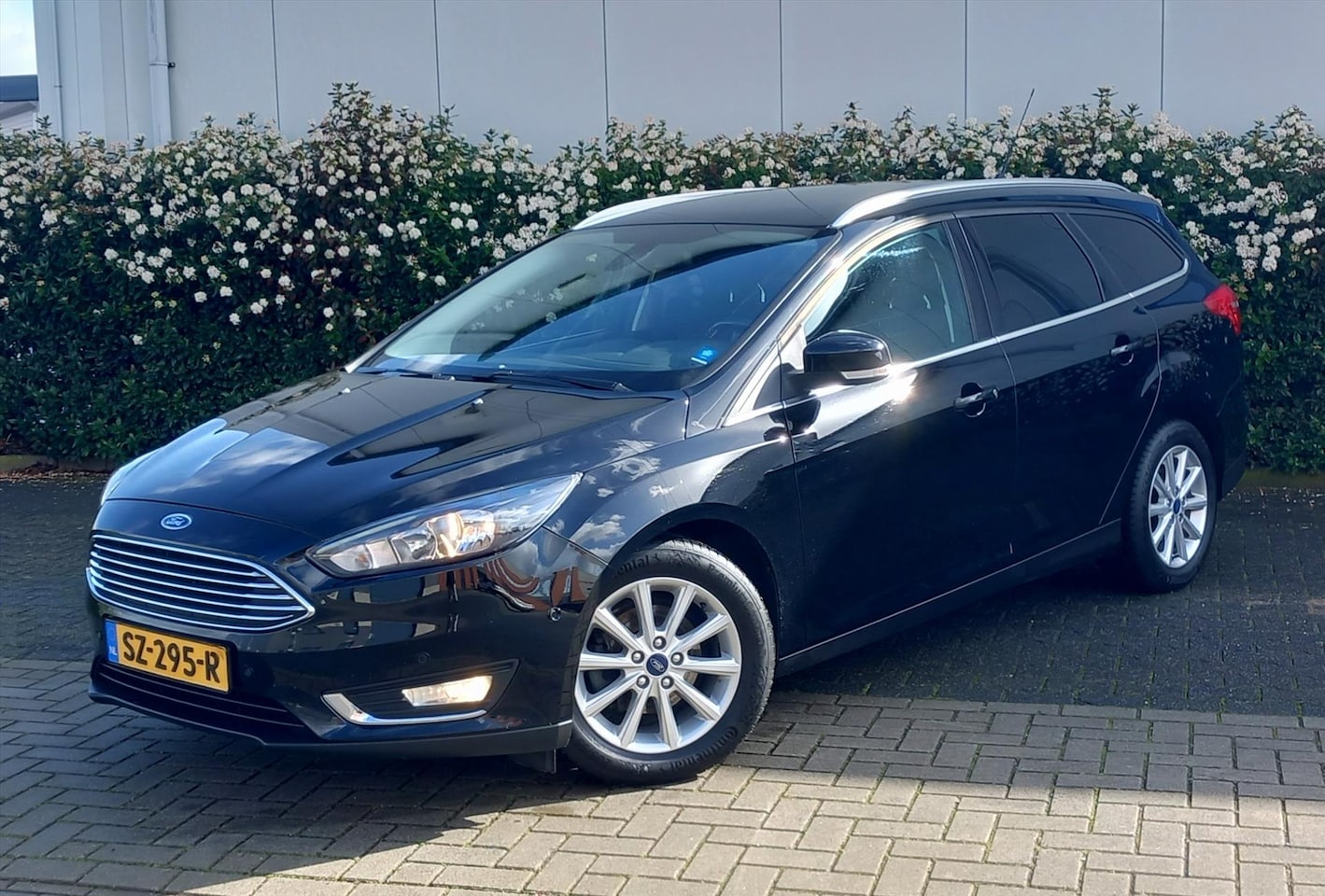 Ford Focus Wagon - 1.5 TDCi 120pk Titanium Navigatie - AutoWereld.nl