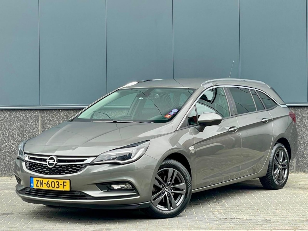 Opel Astra Sports Tourer - 1.0 T. 120 Jaar Ed. 1e eigenaar | NAP - AutoWereld.nl