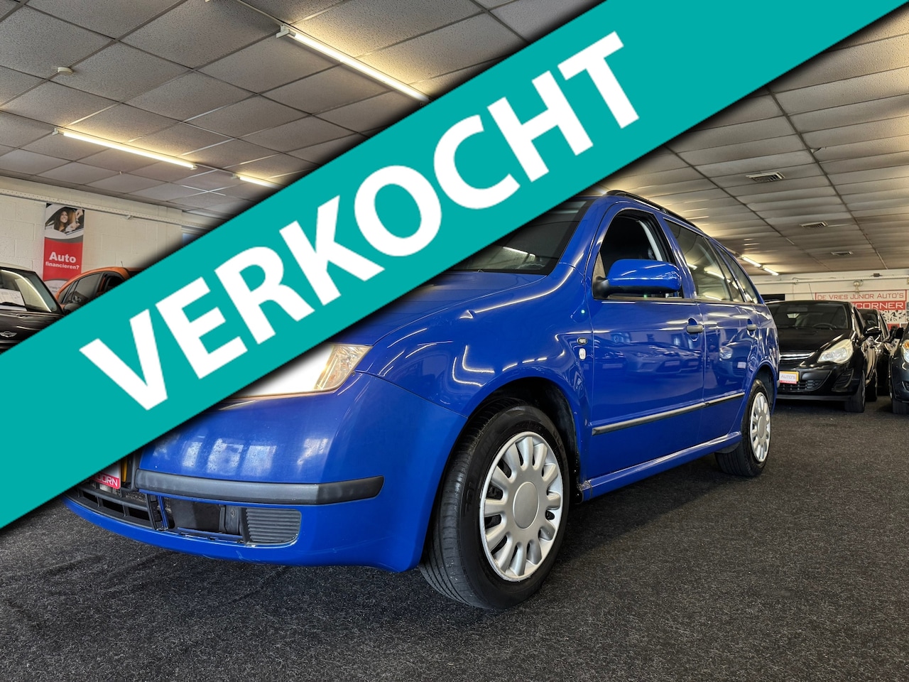 Skoda Fabia Combi - 1.4-16V Comfort. AUTOMAAT, cruise control, airco, BT/touchscreen, trekhaak en meer! - AutoWereld.nl