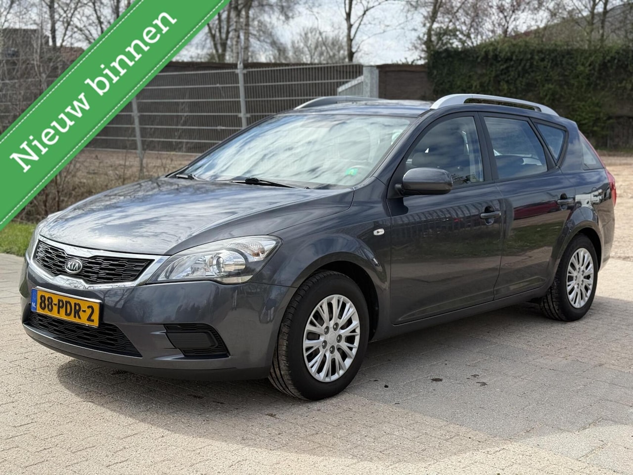 Kia Cee'd Sporty Wagon - 1.4 CVVT X-tra 1.4 CVVT X-tra - AutoWereld.nl