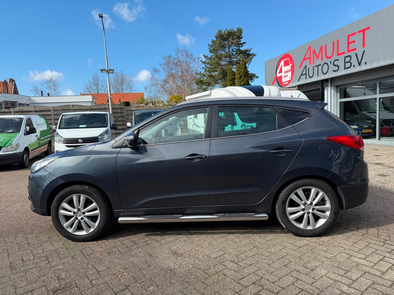 Hyundai ix35 - 2.0i,120kw/163pk,i-Catcher,159.398km - AutoWereld.nl