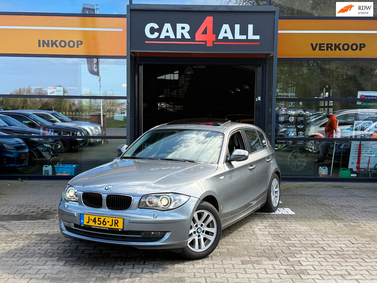 BMW 1-serie - 116i Business Line Sport DAKJE/XENON/NAVI/PDC/CRUISE/CLIMA/STLVRM/APK 31-08-2026 - AutoWereld.nl