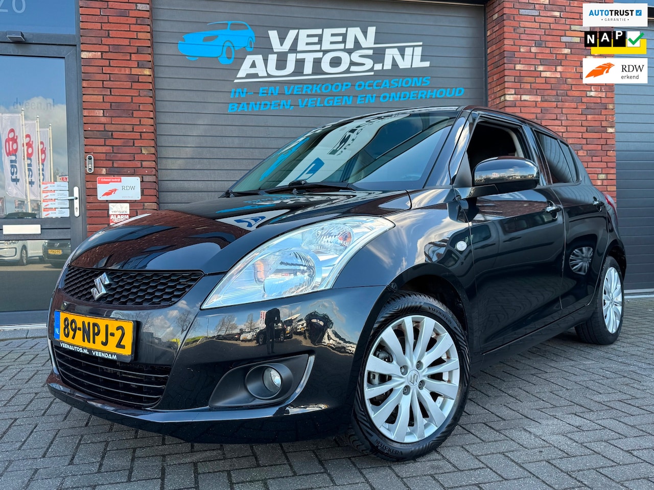 Suzuki Swift - 1.2 Exclusive EASSS Clima Cruise 5 Deurs - AutoWereld.nl