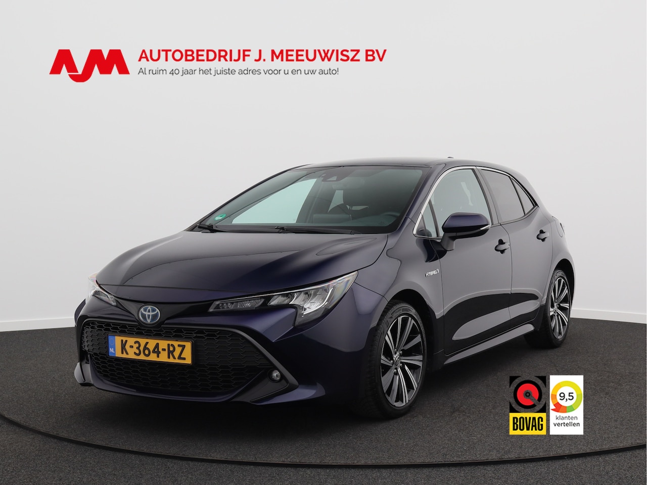 Toyota Corolla - 1.8 Hybrid Business Plus/ lage km/ compleet! - AutoWereld.nl