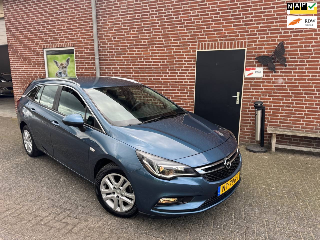 Opel Astra Sports Tourer - 1.0 Online Edition Navi, PDC, Cruise control, LM velgen - AutoWereld.nl