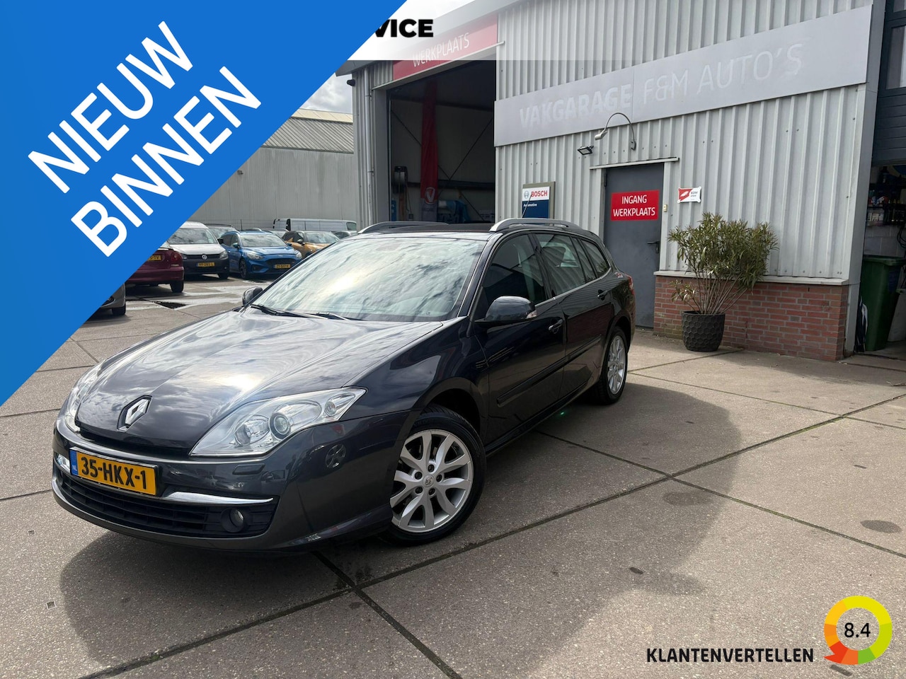 Renault Laguna Estate - 2.0 16V Dynamque Clima, pdc achter - AutoWereld.nl