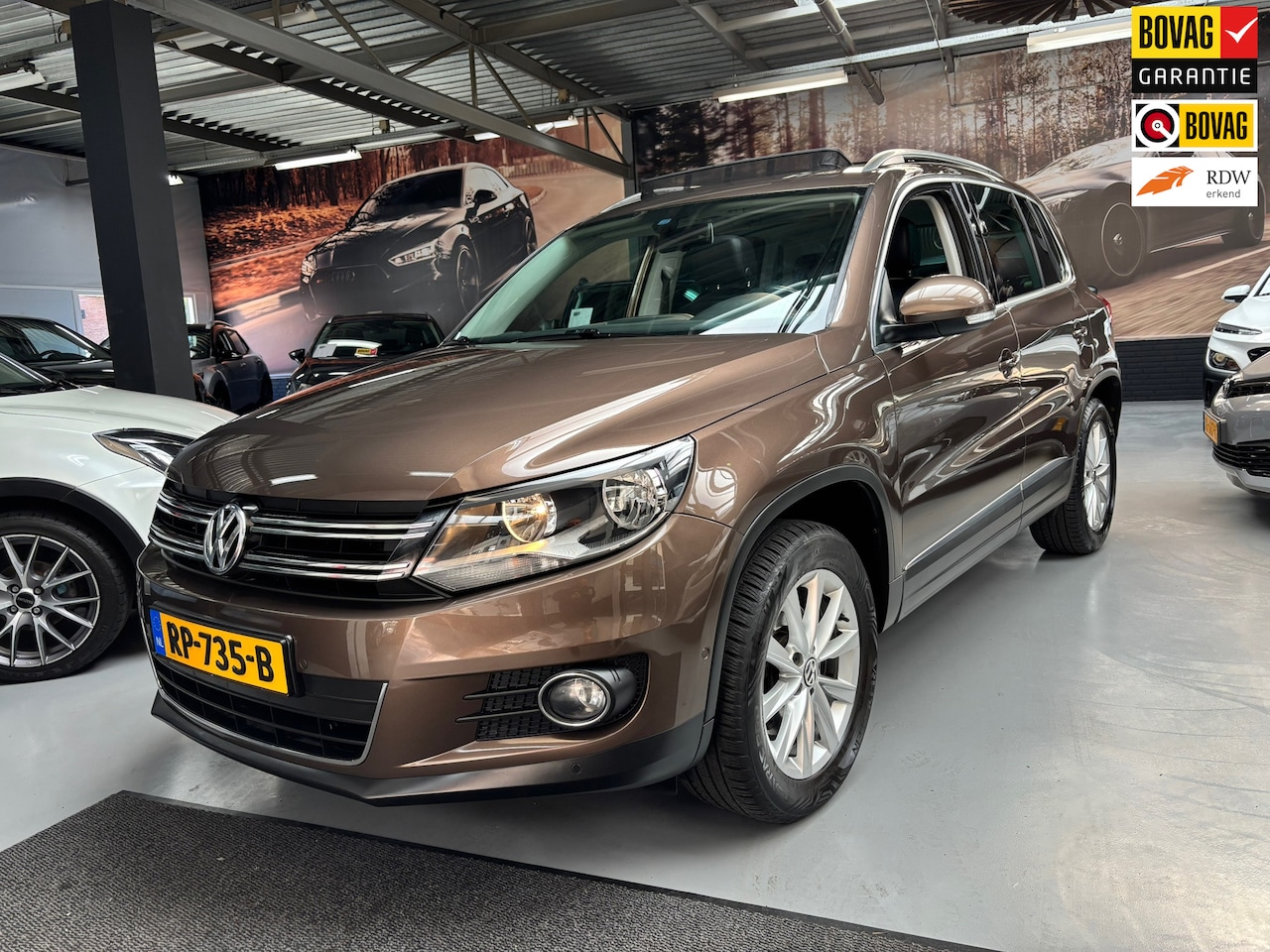Volkswagen Tiguan - 1.4 TSI Sport&Style - AutoWereld.nl