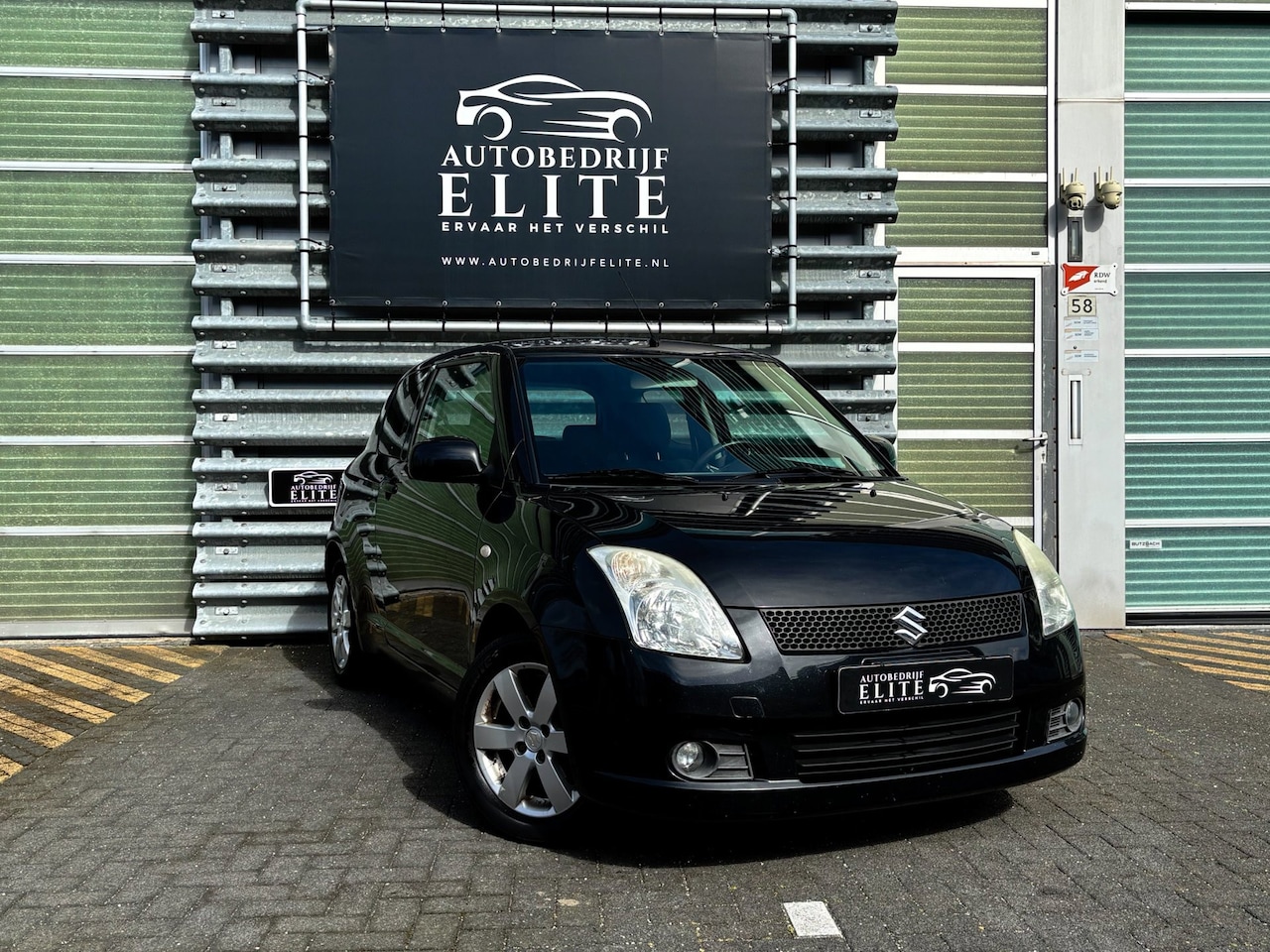 Suzuki Swift - 1.3 Base|Airco|Afneembare trekhaak - AutoWereld.nl