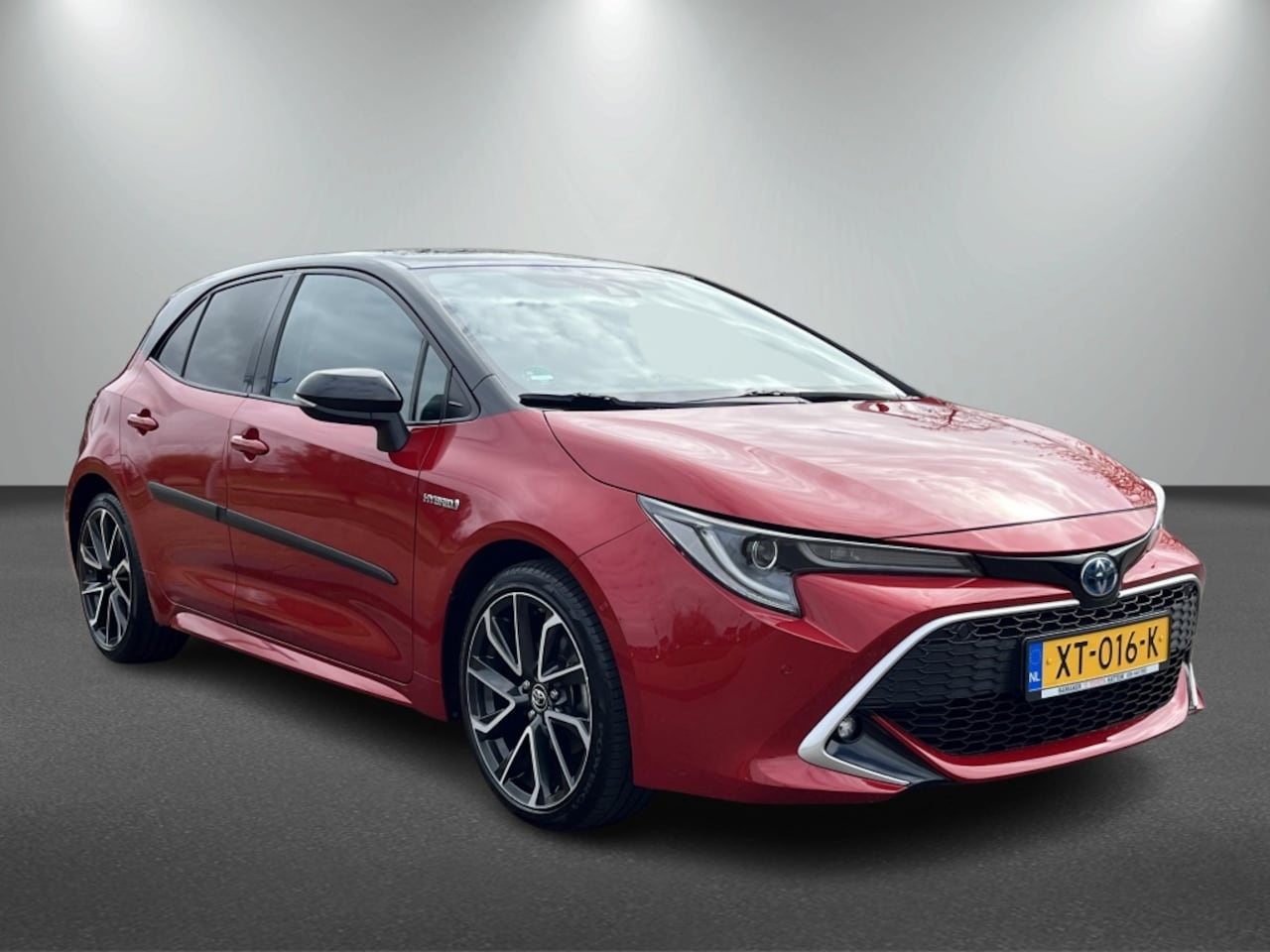 Toyota Corolla - 1.8 Hybrid Executive Bi-Tone - AutoWereld.nl