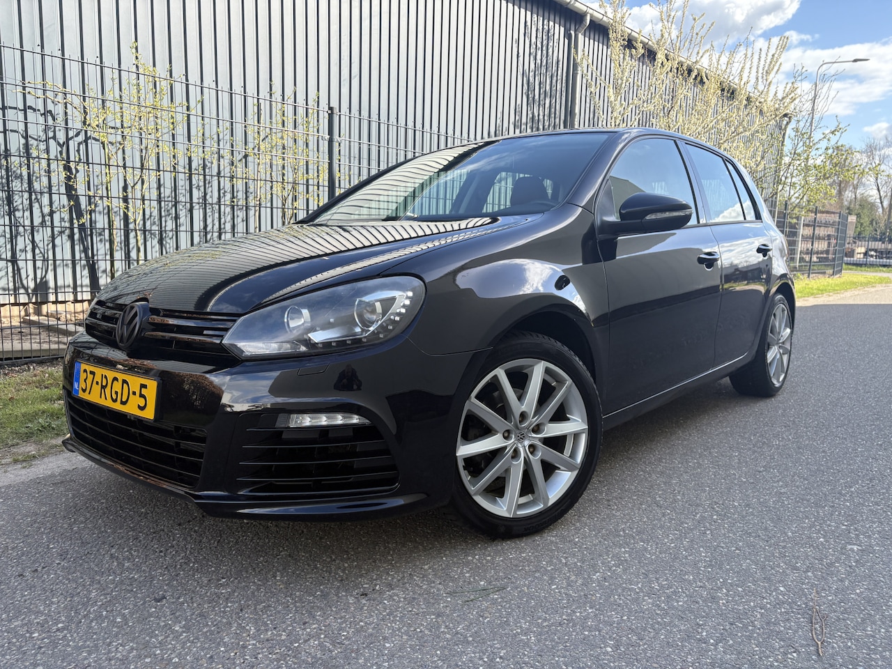 Volkswagen Golf - 1.2 TSI Highline BlueMotion / LEER / R20 PAKKET / NAVI / CRUISE - AutoWereld.nl