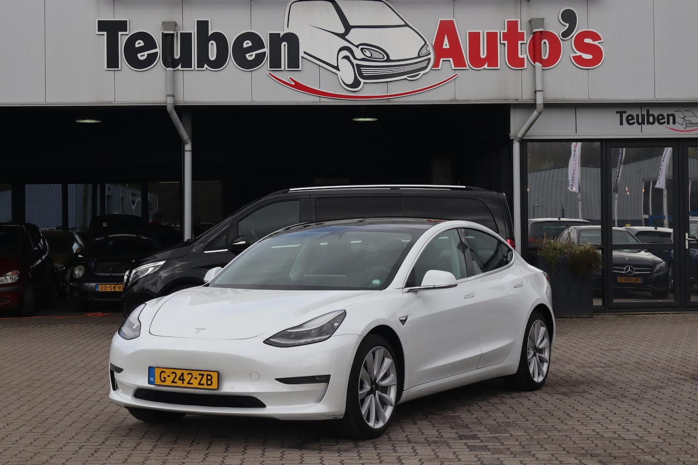 Tesla Model 3 - Long Range RWD Long Range AWD 75 kWh SOH 94,4%, Autopilot computer 3.0, Panoramadak, 360 Camera - AutoWereld.nl