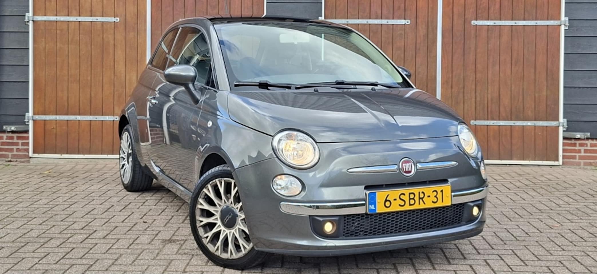 Fiat 500 - 0.9 TwinAir Lounge 0.9 TwinAir Lounge, Stoere auto, Panoramadak, NAP - AutoWereld.nl