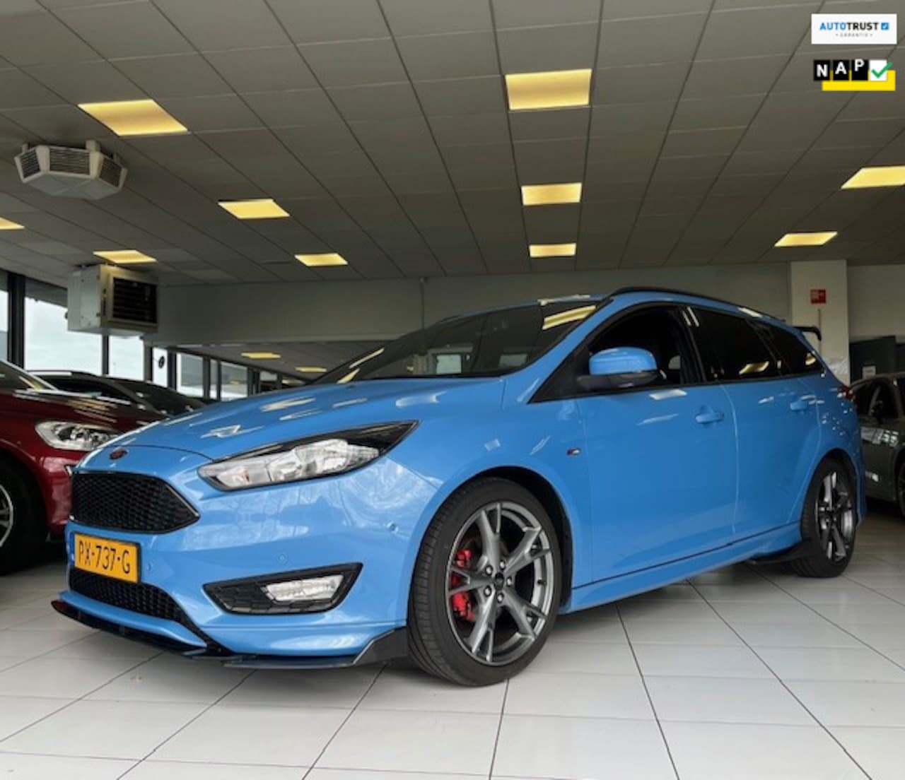 Ford Focus Wagon - 1.0 ST-Line/140PK/NAP/Apple carplay/Navi/Cruise/Stoelverwarming/Airco - AutoWereld.nl