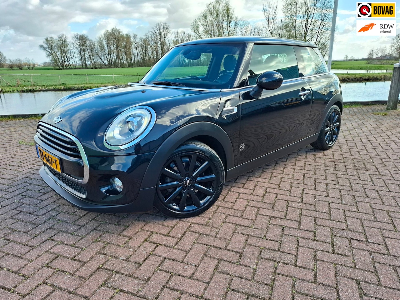 MINI Cooper - Mini 1.5 Chili Serious Business Clima Navi Cruise PDC Stoelverwarming - AutoWereld.nl