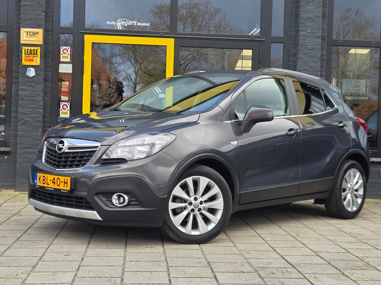Opel Mokka - 1.4 Turbo Cosmo | Camera + Sens | Stoelv | Stuurv | Carplay | Navi | Tel | Climate Control - AutoWereld.nl