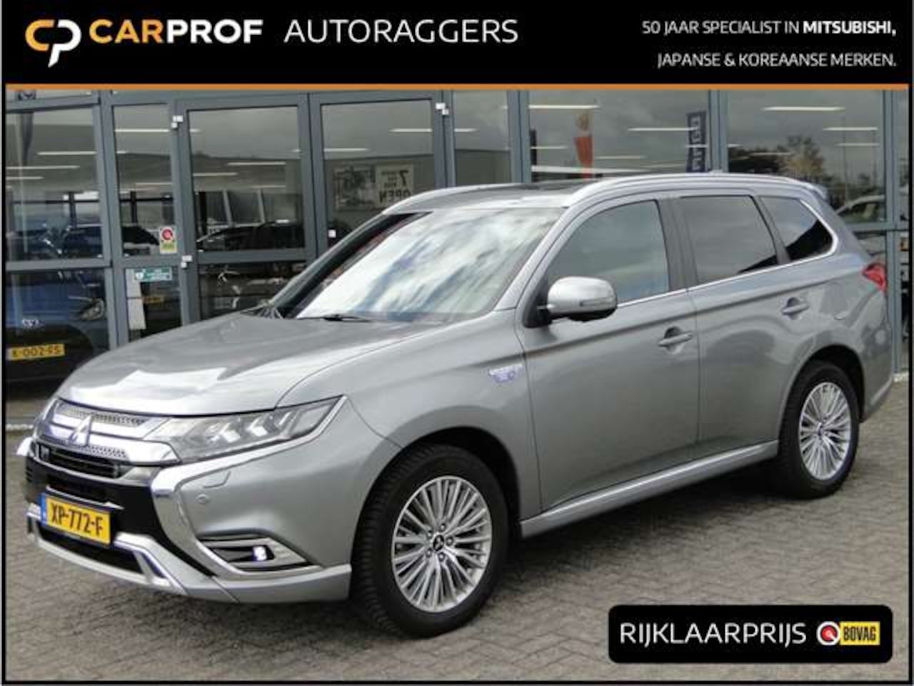 Mitsubishi Outlander - 2.4 Phev 4wd Instyle | Schuifdak | Leer | All-season - AutoWereld.nl