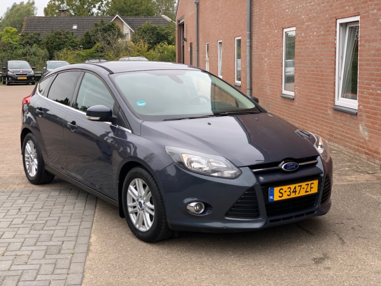 Ford Focus - 1.0 ECOBOOST TITANIUM 125 PK  ECC NAVI LMV - AutoWereld.nl
