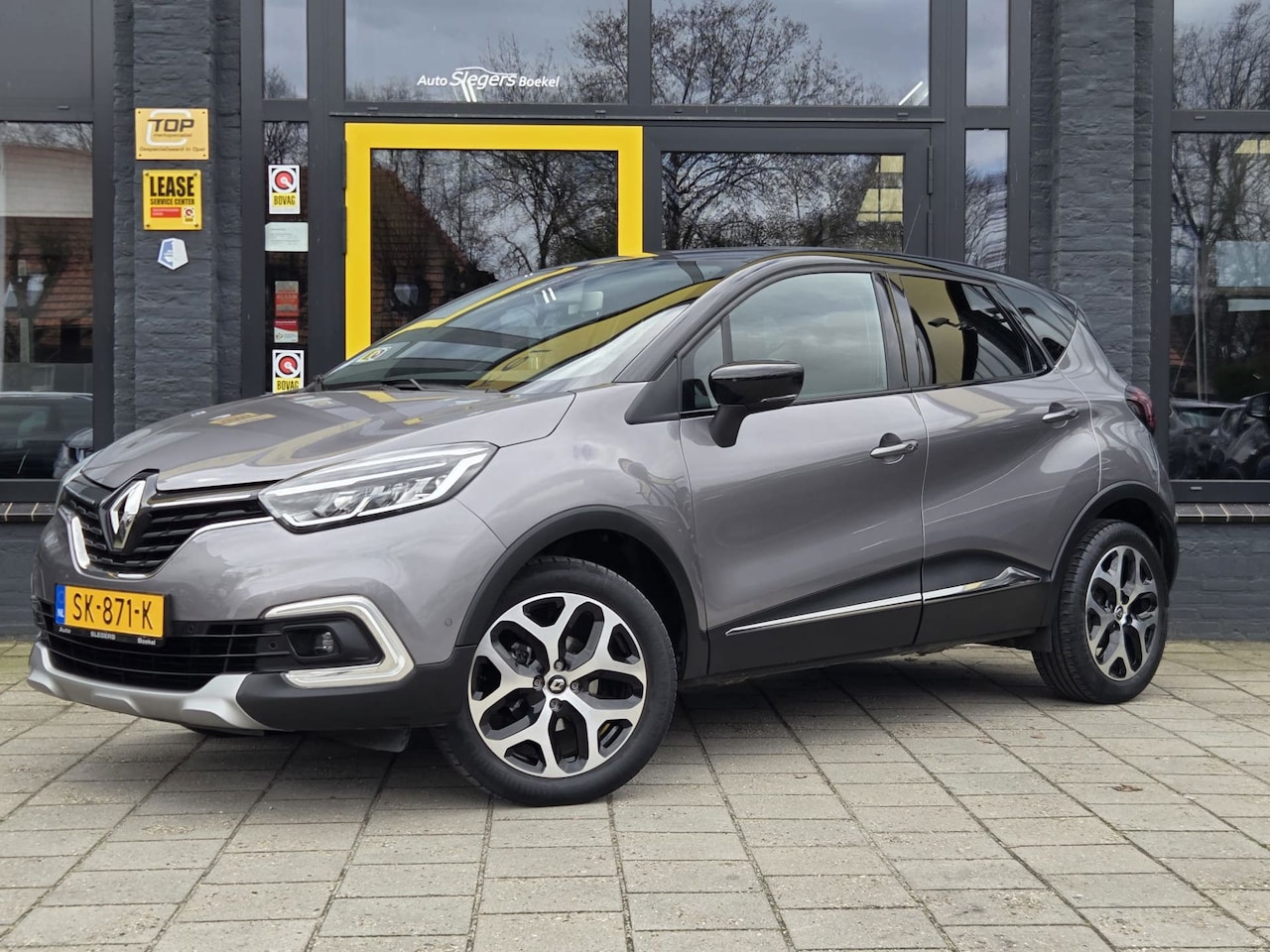 Renault Captur - 0.9 TCe Limited | Trekhaak | Parkeersensoren | Navigatie | Telefoon | Cruise Control - AutoWereld.nl