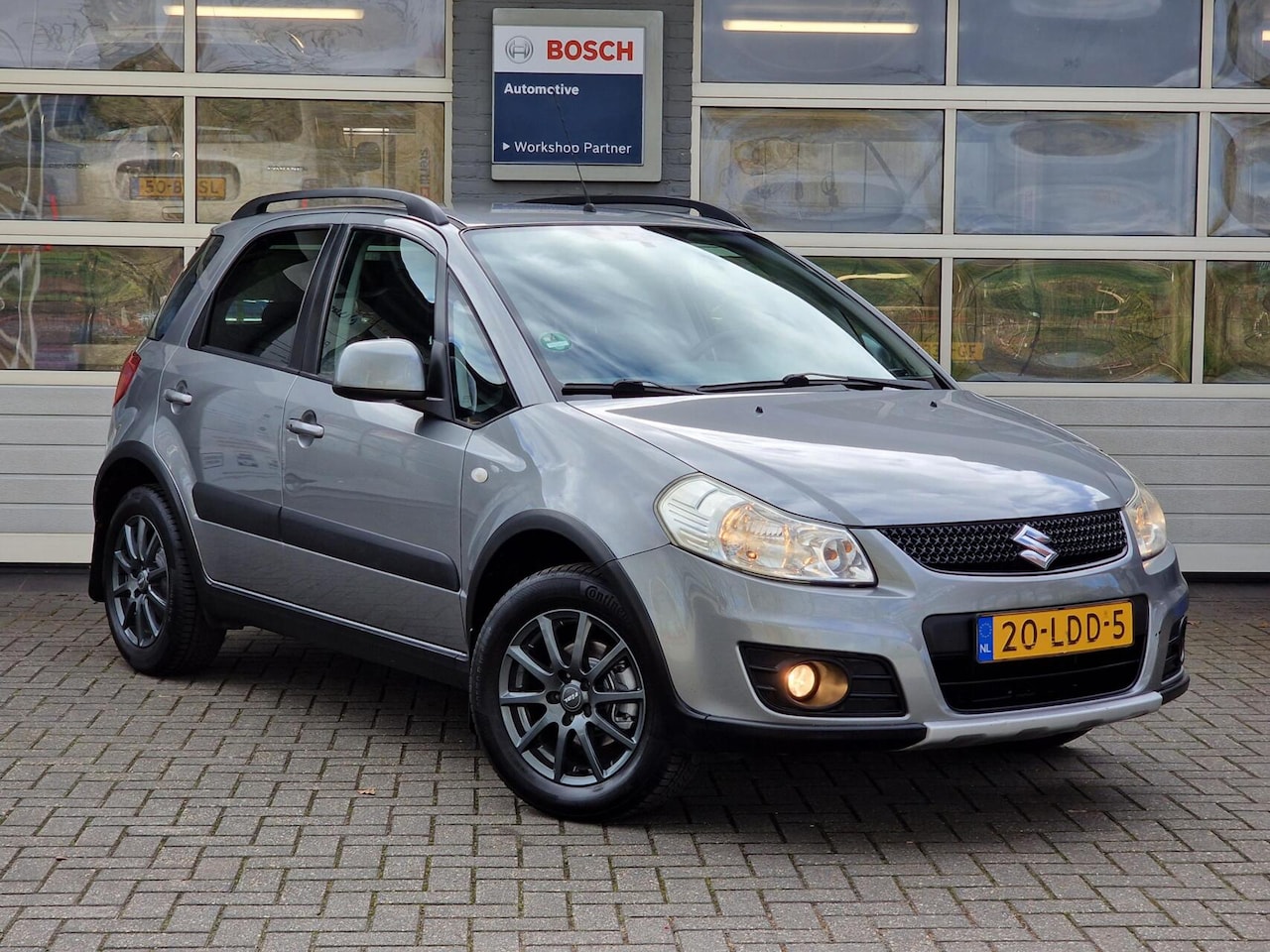 Suzuki SX4 - 1.6 AWD Exclusive 4X4 120PK Trekhaak|PDC|Navi|Clima|Cruise| - AutoWereld.nl