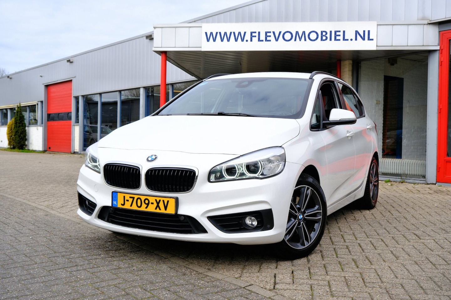 BMW 2-serie Active Tourer - 218i High Executive Aut. Leder|Navi|Clima|LMV - AutoWereld.nl